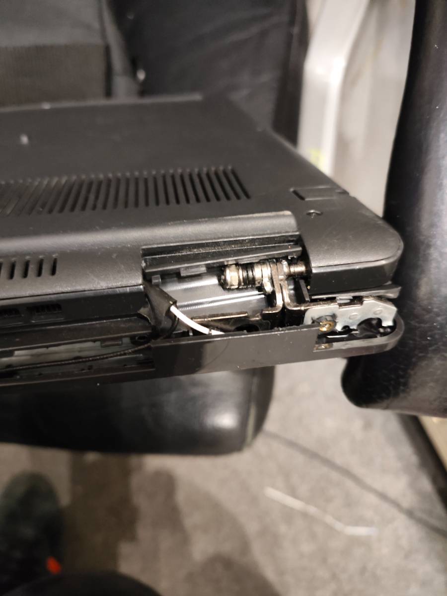 Laptop hinge mechanism failure requiring repair in Cheadle Hulme